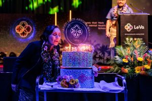 Denise Kingi 'Ulu'ave blowing out birthday candles for Le Va
