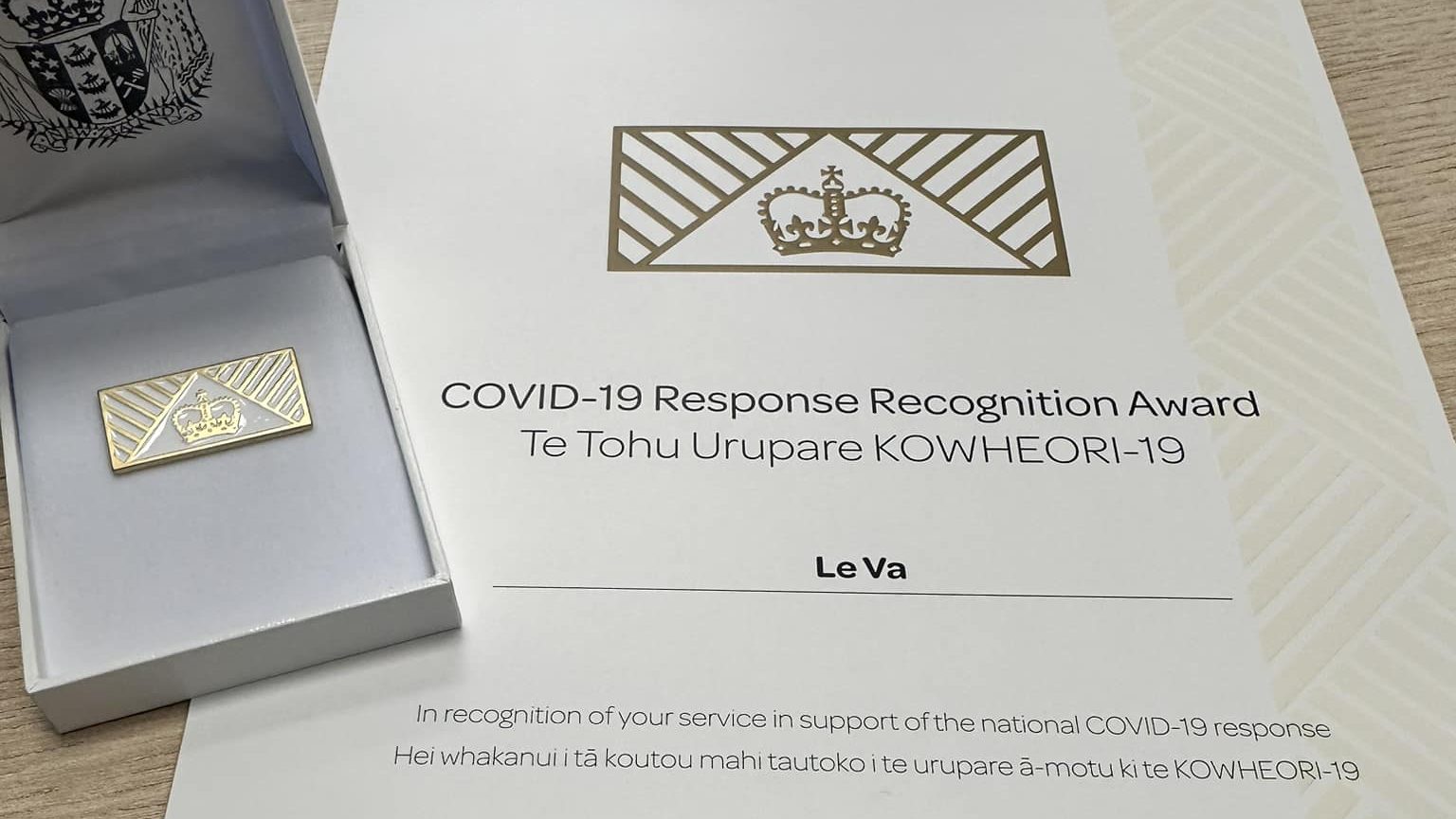 Covid response award certificate and medal