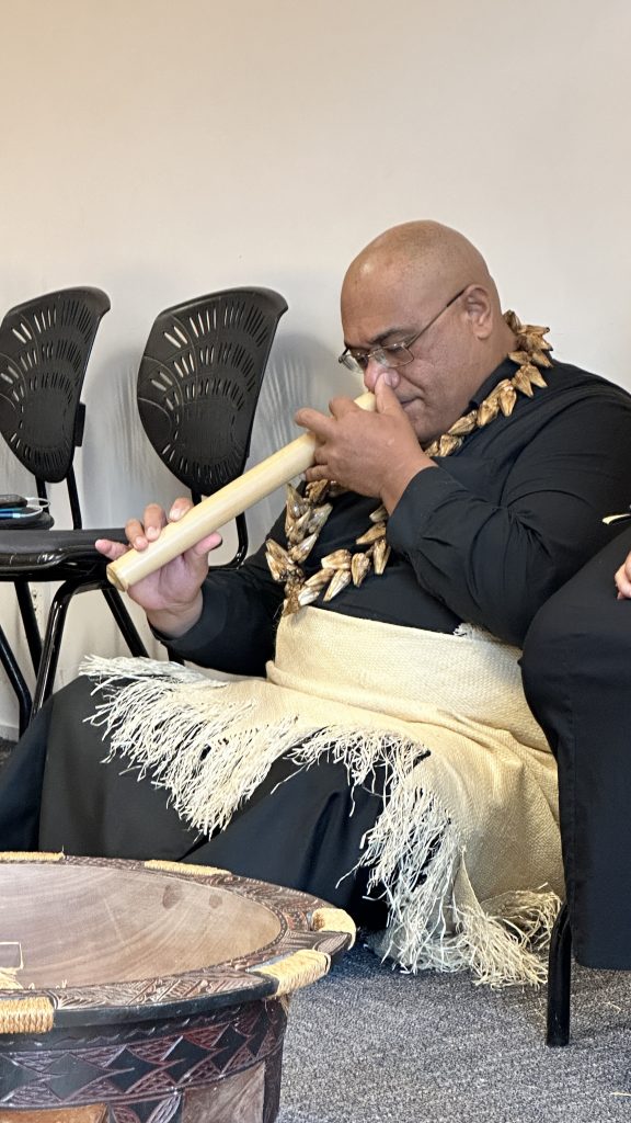 Manase Lua playing the Tongan nose flute